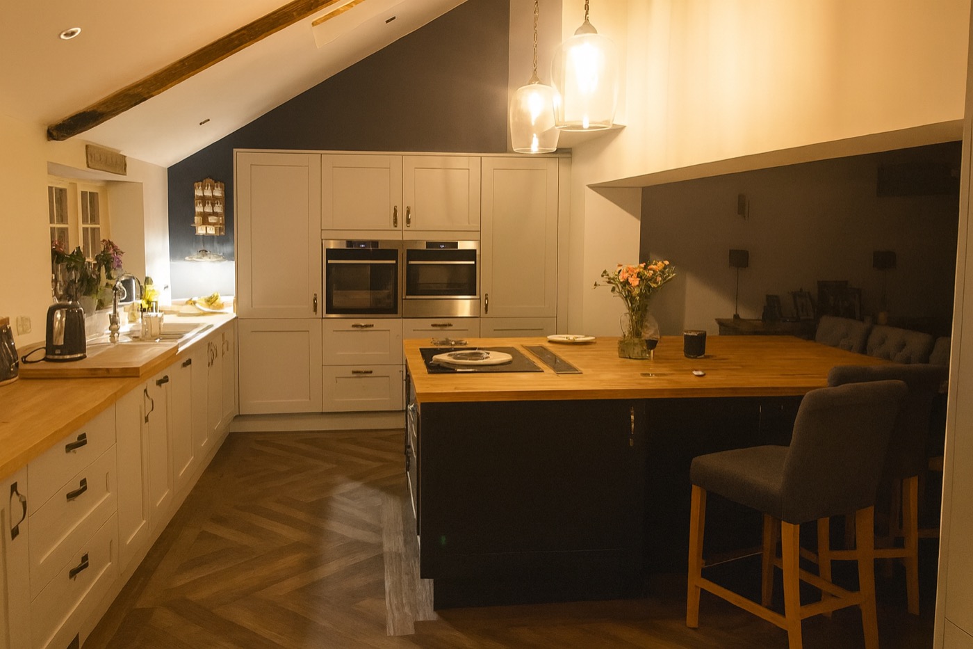 A finished kitchen refurbishment by B K Property Services at Caythorpe — shaker cabinets, oak worktops and parquet floor